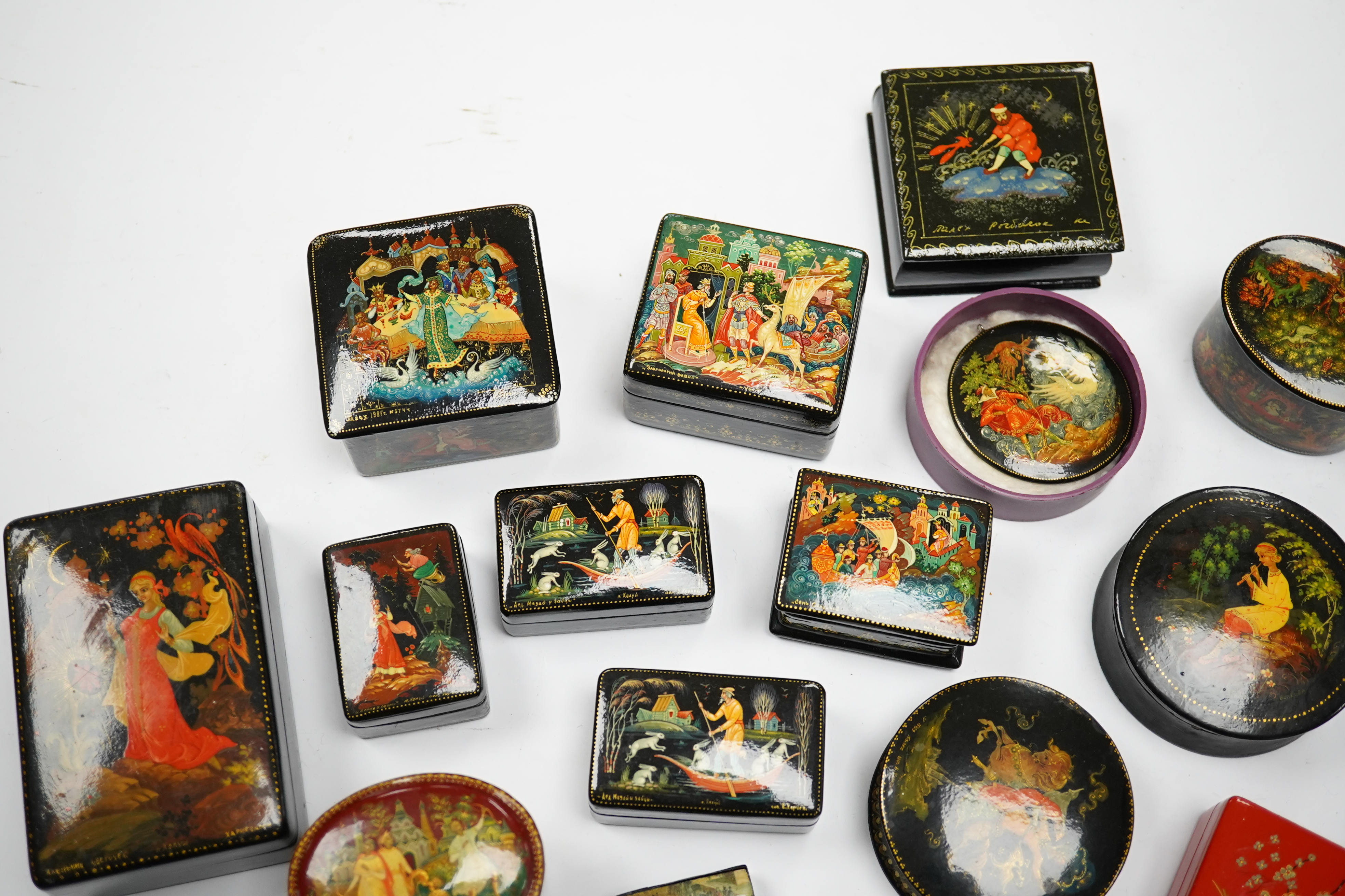 A quantity of late 19th / early 20th century Russian lacquer boxes, largest 9cm. Condition - mostly good